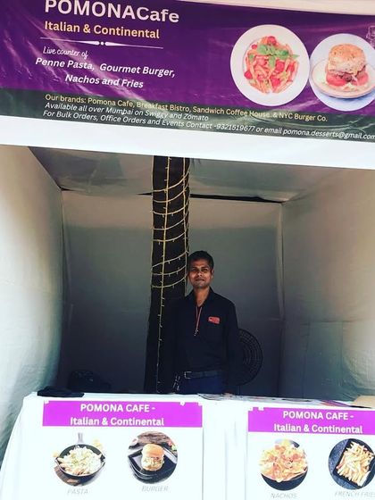 My catering stall setup for the Chembur Durga Puja festival. I offer a range of Italian and Continental dishes like pasta and gourmet burgers, bringing a unique flavour to traditional events.