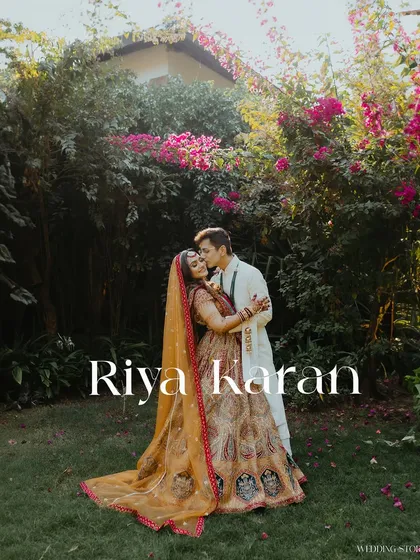 A romantic portrait of a couple in a lush garden on their wedding day, capturing a quiet moment of love after the ceremony.