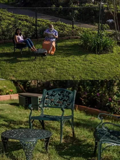 A quiet seating area on the lawn, demonstrating how the outdoor spaces are designed for relaxation and enjoying the natural beauty of the location.