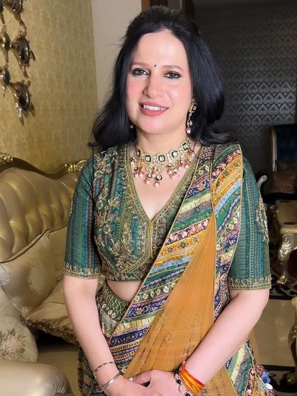 A beautiful portrait of the bride's mother, showcasing the glowing, age-appropriate makeup that makes her shine.