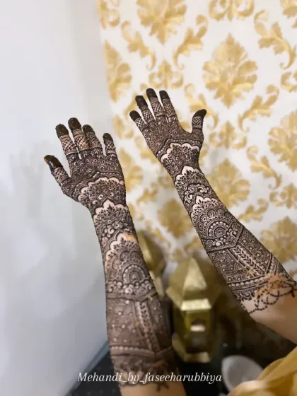 A clear shot of the intricate patterns on Shaziya's arms, combining traditional motifs with a modern aesthetic.