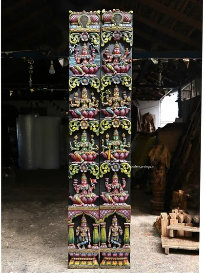 This pair of 72-inch vertical panels features the eight forms of Goddess Lakshmi (Ashta Lakshmi), each meticulously carved and painted. When placed together, they create a powerful and auspicious entryway or wall feature.