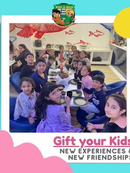 A group of children enjoying a meal together in our cafe seating area. The space is designed to be comfortable for group lunches during parties or playdates.