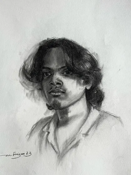Another charcoal portrait study. I focused on capturing the volume and flow of the hair, using soft shading and sharp lines to create a realistic and engaging portrait.