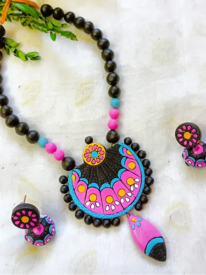 A playful pink and blue version of the fan-shaped pendant necklace.