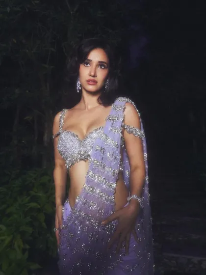For this look with Disha Patani, I created a soft yet glamorous makeup style to complement this stunning lavender Monisha Jaising saree. The focus was on luminous skin, defined eyes, and a soft lip, creating a perfect ensemble for a sangeet or wedding reception.