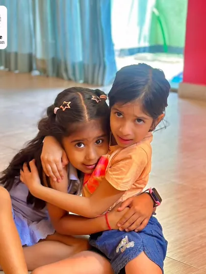 The friendships and bonds formed during our workshops are just as important as the skills learned. A sweet hug between two young participants.