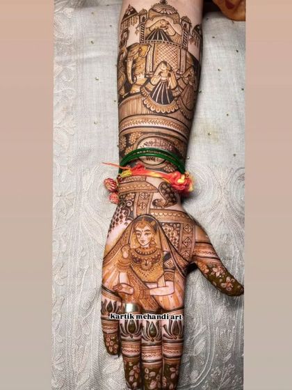 A single-hand bridal design featuring a beautiful portrait of a bride. The arm is adorned with a detailed baraat scene, showing that even a one-hand design can tell a big story.