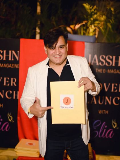 Pointing to my feature in the magazine. Seeing your work and story in print is always a special feeling. Thank you for the beautiful article.