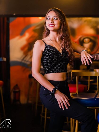 A guest in a Gucci-branded top.