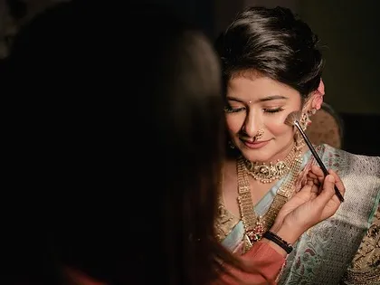 A behind-the-scenes look at the engagement glam process. The final look is a testament to the detailed work that goes into creating a flawless finish.