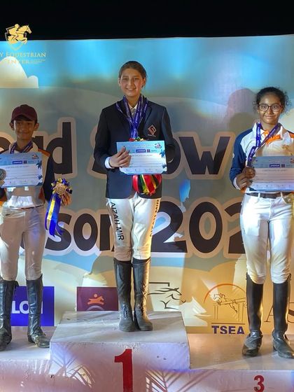 Team Zippy riders on the podium at the NASR Polo Summer Equestrian Championship. Arnav secured second place in the 90cms category.