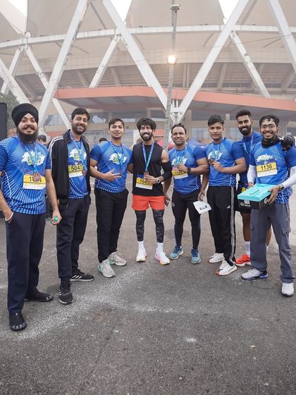 Our team proudly showing off their medals after completing the Dilli 10K run. A great achievement for our fitness community.
