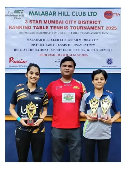 Another shot of our champions with their coach. The bond between a coach and player is crucial for success, and we foster that relationship at Spinart.