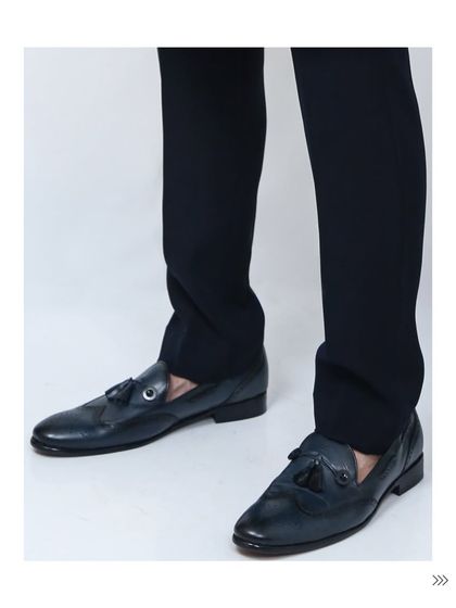 Don't forget the shoes. These black leather loafers with a tassel detail are the perfect finishing touch for both Indian and Western formalwear.