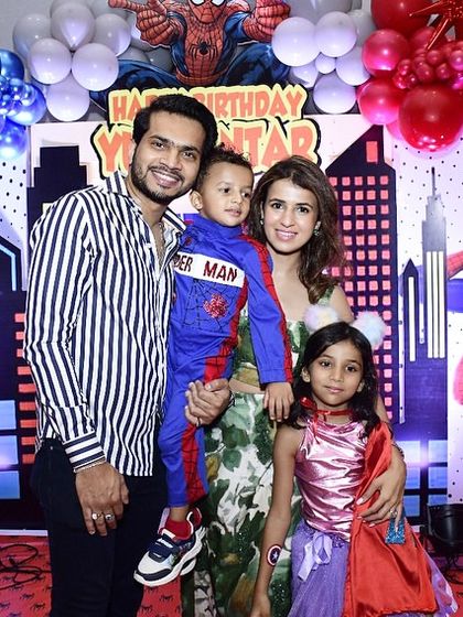 A beautiful family portrait in front of the Spider-Man party decor. My goal is always to create a backdrop so perfect that it becomes the setting for cherished family memories.