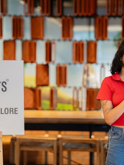 A young poet shares her work, adding her voice to the celebration of mothers and their influence.