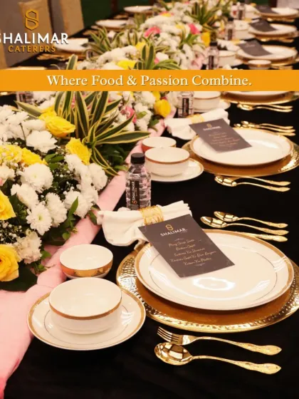 We believe this is where food and passion combine. A full view of our long table arrangement, demonstrating how we integrate lush floral runners with our elegant place settings for a cohesive and beautiful look.