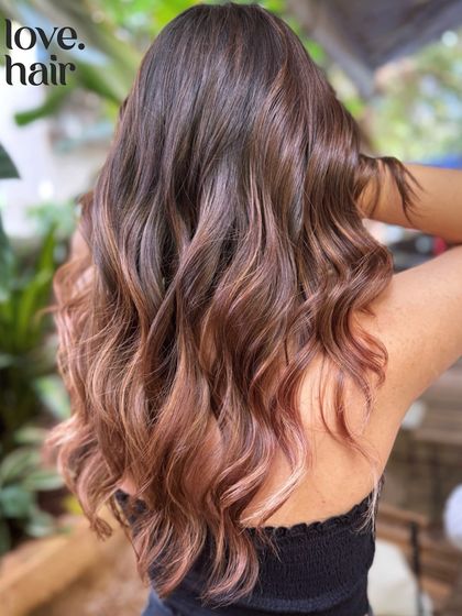 Another angle of the 'blush' balayage, capturing the beautiful blend of warm brown and soft pink from the back.