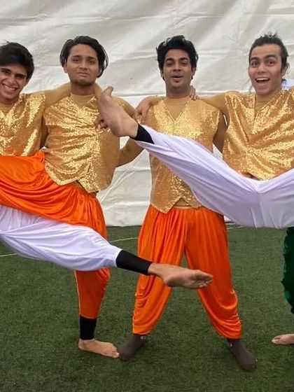 A fun, behind-the-scenes moment from the celebration of 50 years of Meghalaya's statehood. This image captures the spirit of the dancers, forming the Indian tricolor with acrobatic flair.