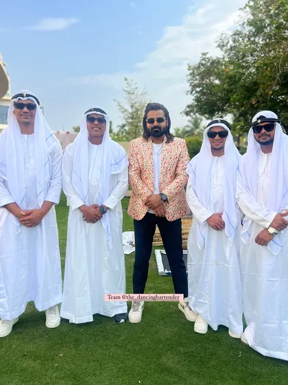The team posing in our Arabian nights attire. We coordinate our outfits to ensure a cohesive and immersive experience for your themed event.