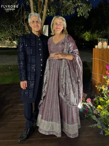 When your outfit is rented but your confidence is all yours. This elegant couple looks timeless in their coordinated ethnic wear.