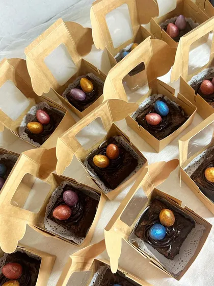 My egg nest brownies are also available as individual party favors or small gifts. Each brownie is packed in its own little box, making them perfect for sharing.