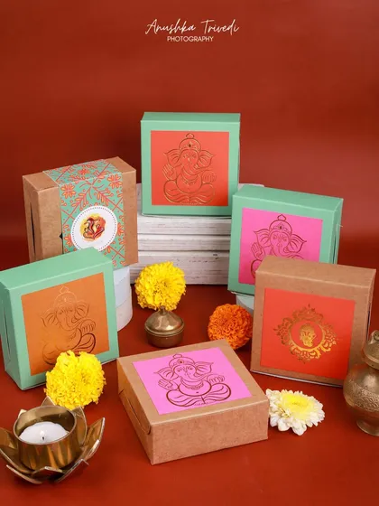 A collection of festive gift boxes for Ganesh Chaturthi. This shot is perfect for a brand to showcase their special packaging for the season.