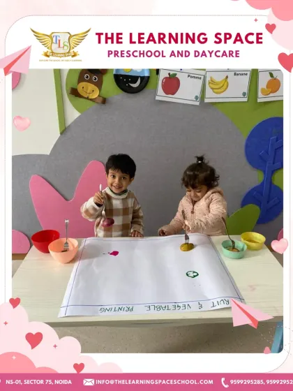 Two children happily stamping colorful vegetable prints. This activity is a feast for the senses and a great way to introduce concepts of shape, pattern, and color.
