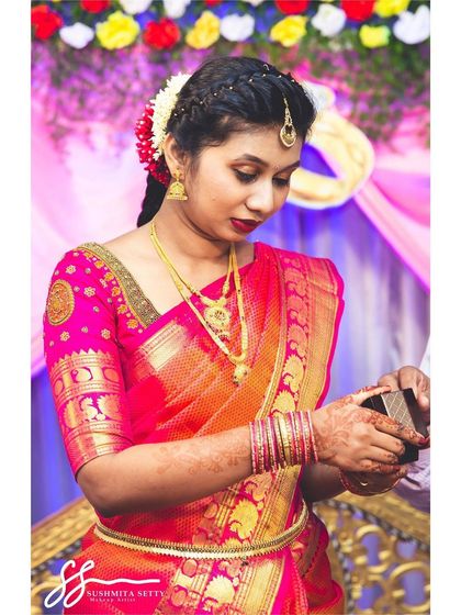 A beautiful candid of the bride-to-be. Her traditional South Indian hairstyle with fresh flowers is perfectly complemented by the classic makeup look I created for her.