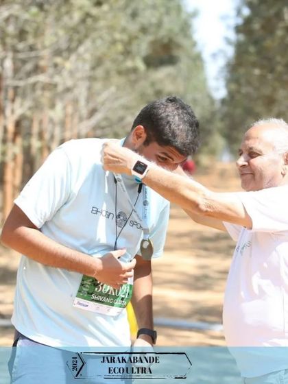 The ultimate prize. Runners from our various events proudly display their finisher medals, a tangible reminder of their strength, endurance, and accomplishment.