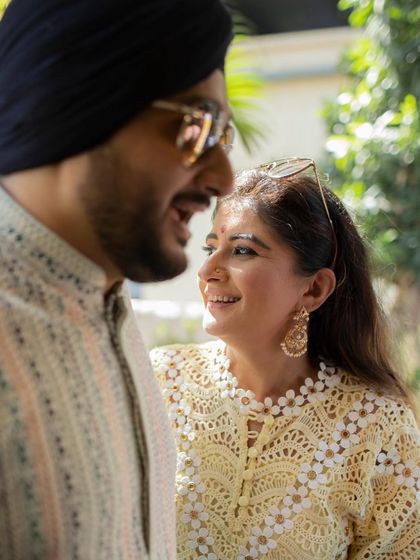 A candid and happy portrait of a couple from their intimate registered wedding. Their easy smiles and loving glance capture the joy of the moment.