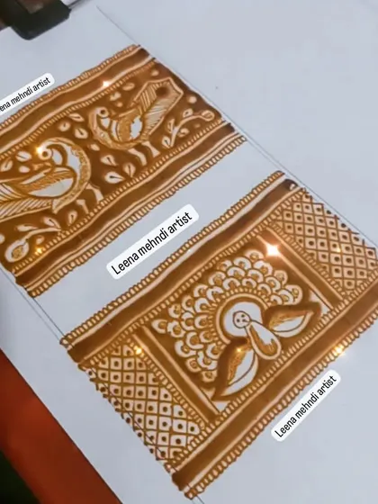 Practice drills for heavy bridal borders. These examples show different ways to incorporate peacock motifs into the intricate bands used in bridal mehndi.
