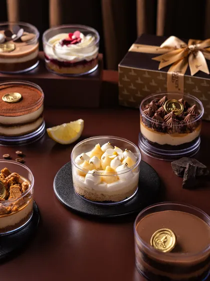 A glimpse into my late-night dessert menu, handcrafted in small batches. From the zesty Lemon Cake to the classic Tiramisu, each dessert tub is a personal treat, also available in a curated gift box.