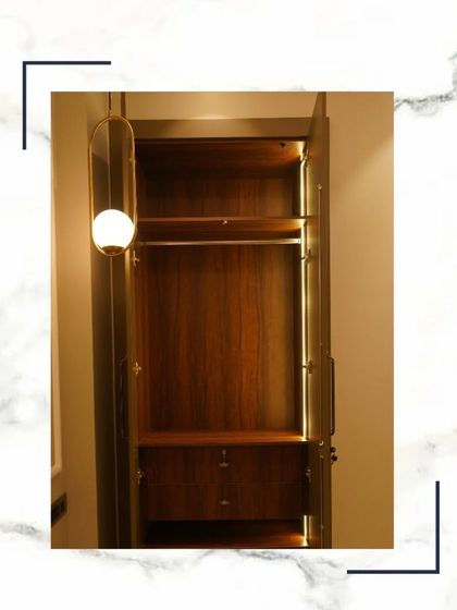 A close-up of one of our wardrobe interiors, featuring a stylish pendant light. We believe that even the inside of a closet should be designed with elegance and care.