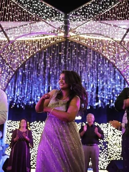 The bride dancing with her parents under a stunning canopy of lights. I always encourage parents to join in the fun.