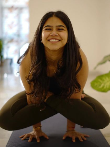 The thought of the weekend bringing a smile during Kukkutasana. This arm balance requires strength, but also a sense of lightness and fun.