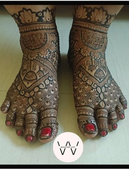 A beautiful bridal feet design with intricate details and a lotus cuff.