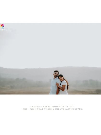 A wide, minimalist shot that uses negative space to emphasize the couple's connection and the quiet promise of forever.