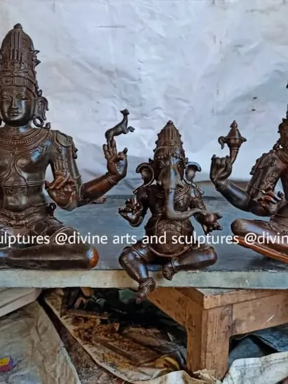 A 24-inch Shiva Parivaram set in the wax modeling stage, resting on a workbench in our studio. This image provides a behind-the-scenes look at our creation process.