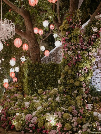 As evening fell, the trees at Radhika and Anant's celebration were lit with hanging lanterns and chandeliers, transforming the garden into a magical, twinkling wonderland.