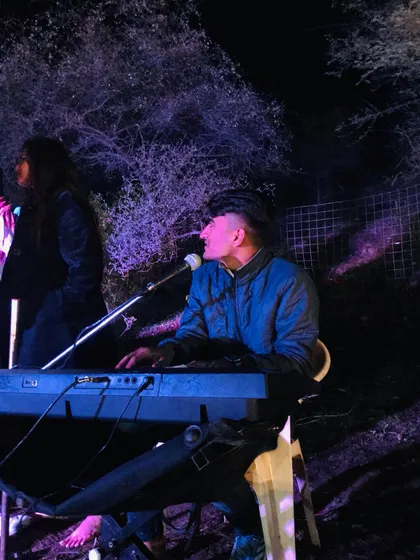 We also feature live music performances at our camps. A musician performs on the keyboard, providing a great soundtrack for a memorable evening with friends.