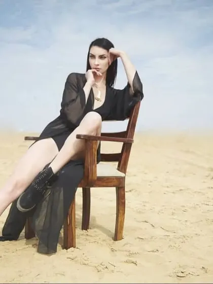From a calendar shoot in the Bikaner desert. I styled a sheer black kaftan and ankle boots to create a dramatic, nomadic-glam look, using the vast, empty landscape as a powerful backdrop.