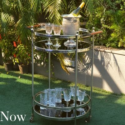 The summer sun is shining. My classic two-tiered bar trolley in a silver finish is perfect for hosting guests outdoors, keeping drinks and glasses within easy reach.
