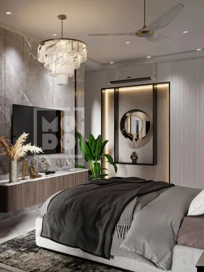 This luxurious bedroom blends contemporary elegance with cozy warmth. It features a statement chandelier, a marble-textured TV console, and layered textiles for a sophisticated touch.