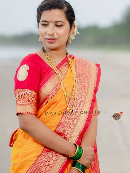 The same client in an outdoor setting, showing how the natural makeup looks fresh and beautiful in daylight.