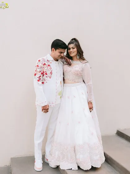 A relaxed and happy portrait. The way Kartik is leaning on Sakshi shows their comfortable and easy connection.
