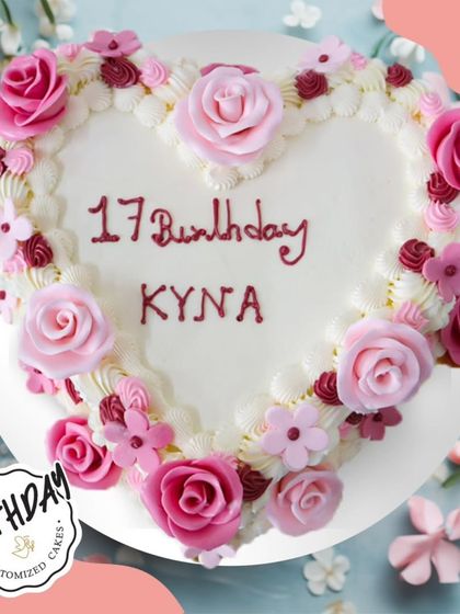 A heart full of flowers for Kyna's 17th birthday in South Ex. This heart-shaped cake is framed with a border of intricate pink buttercream roses and flowers, making it a truly sweet seventeen celebration.