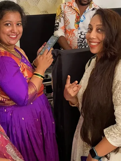 A candid moment of appreciation with a client backstage. Coordinating the music and performances is a big part of my job.