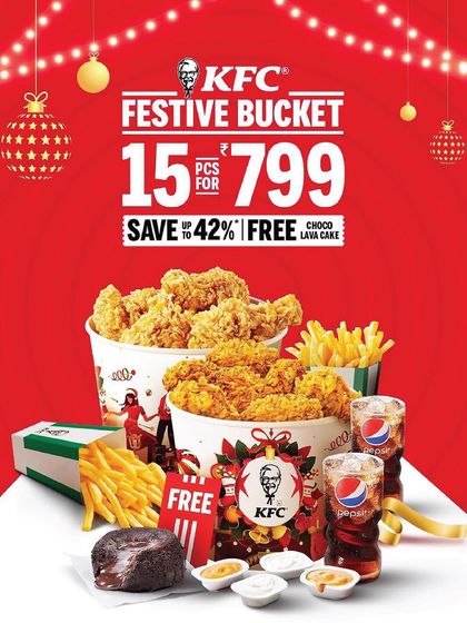 Get into the festive spirit with a KFC Festive Bucket. It's a complete meal with chicken, fries, drinks, and even a free choco lava cake, perfect for sharing.